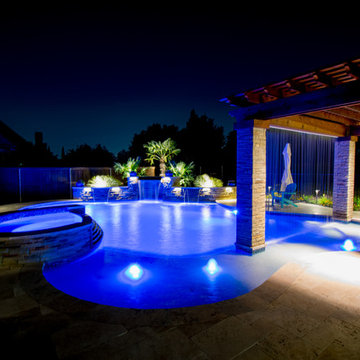 Transitional Curved Pool with Amazing Water Features