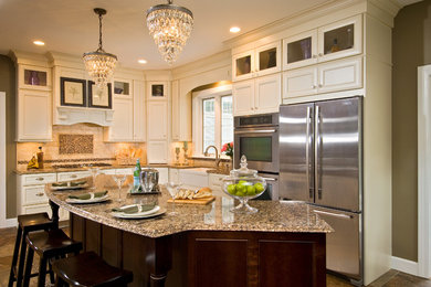 Eat-in kitchen - transitional eat-in kitchen idea in Boston with recessed-panel cabinets, beige cabinets, quartz countertops and an island
