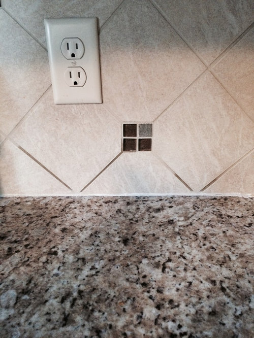 Olive oil in backsplash grout