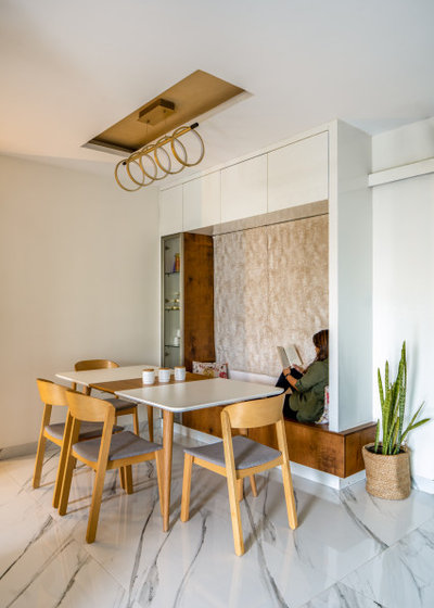 Contemporary Dining Room by EKAA STUDIO