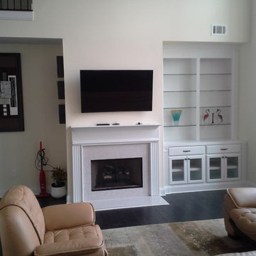 Fireplace Built-in with glass shelves and doors