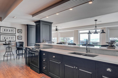 Example of an arts and crafts home bar design in Other