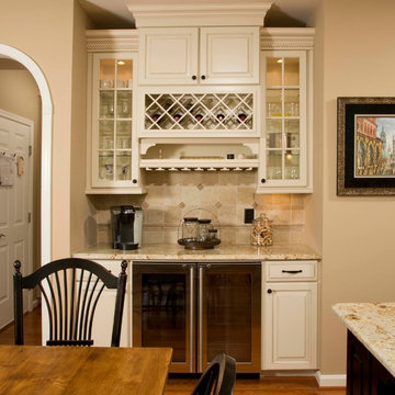 Custom Cabinets, Arched Windows and Doors Provide This Kitchen Its Character