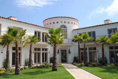 This is an example of a large mediterranean front yard landscaping in Santa Barbara.
