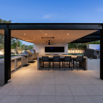 Contemporary Outdoor Escape in Scottsdale Spa, Outdoor Bar & Luxury Waterfall
