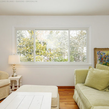 Huge Triple Slider in Contemporary Living Room - Renewal by Andersen Long Island