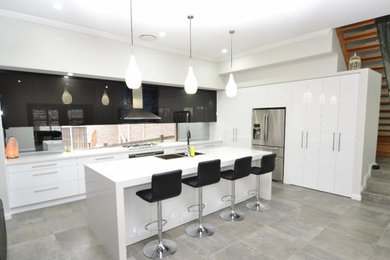 Photo of a large contemporary kitchen in Sydney with with island.