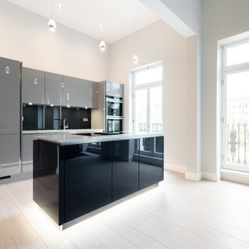 High gloss single wall kitchen layout with island