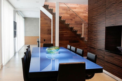 Large minimalist kitchen/dining room combo photo in Toronto with white walls