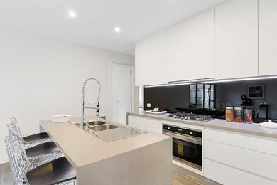 Photo of a contemporary kitchen in Melbourne.