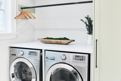 Laundry room - contemporary laundry room idea in Other