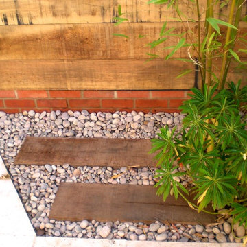 small courtyard space, wooden partition wall