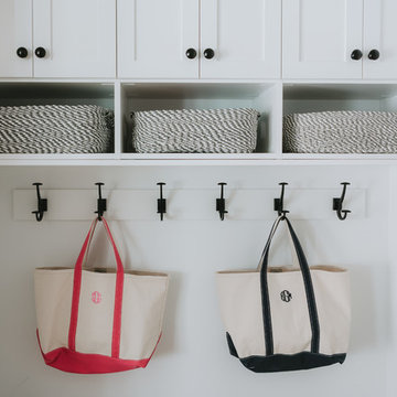 Classic White Mudroom with Hooks and Bench