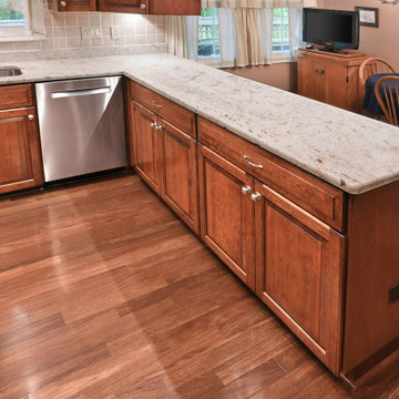 Traditional Chestnut Cherry Kitchen in Reston, VA