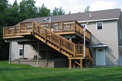 Deck - mid-sized backyard deck idea in Boston with no cover