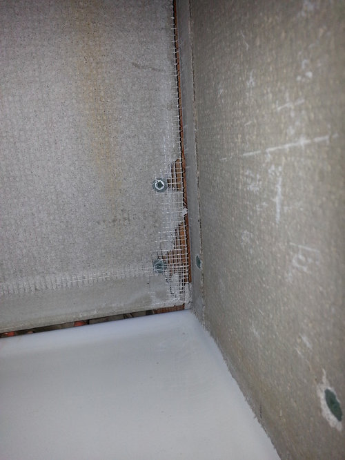 cement board in shower, corners crumbled