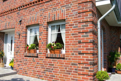 Brick exterior home idea in Chicago