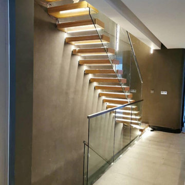 Red oak floating Staircase with LED lights