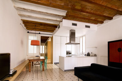 Example of a large eclectic formal and open concept living room design in Barcelona with white walls