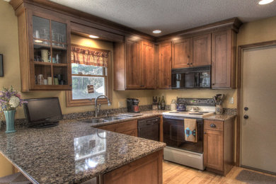 Inspiration for a mid-sized rustic u-shaped light wood floor eat-in kitchen remodel in Other with an undermount sink, shaker cabinets, medium tone wood cabinets, quartz countertops, black appliances and a peninsula