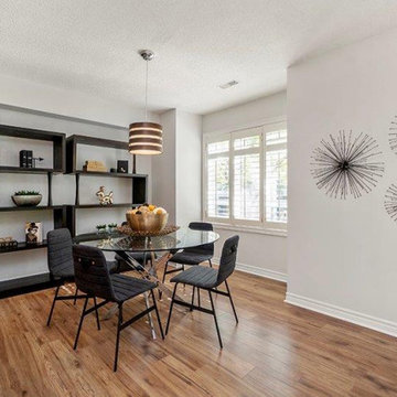 Mid-century modern dining room with custom shelving