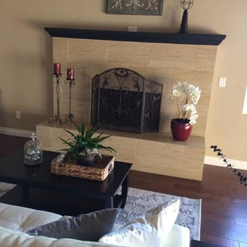 A stunning fireplace renovation and staging create an inviting space!