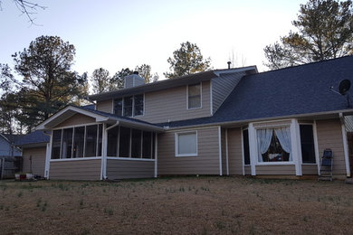 This is an example of a traditional porch design in Atlanta.