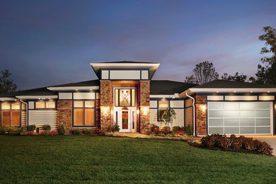 Mid-sized minimalist attached two-car garage photo in Kansas City