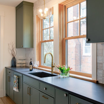 Warm Modern Kitchen Renovation with Natural Oak & Green Accents