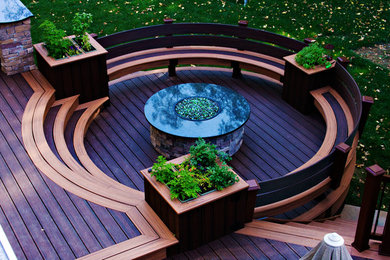 Inspiration for a mid-sized contemporary backyard deck in Philadelphia with a fire feature and no cover.