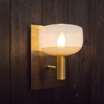 Shou Sugi Ban Charred Wall Cladding with Handblown Glass Sconce