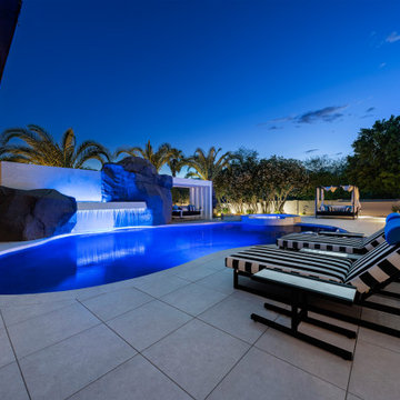 Contemporary Outdoor Escape in Scottsdale Spa, Outdoor Bar & Luxury Waterfall
