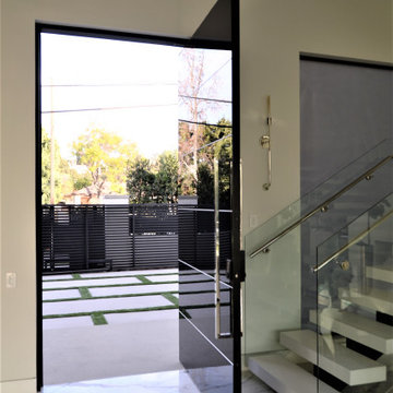 Custom Frameless Black Laminated Glass Oversized Pivot Door