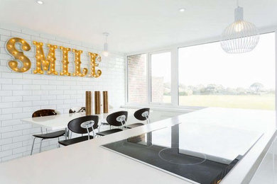 Design ideas for a contemporary kitchen in Hampshire.