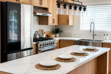 Large trendy l-shaped brown floor and medium tone wood floor open concept kitchen photo in Los Angeles with shaker cabinets, brown cabinets, quartzite countertops, multicolored backsplash, stainless steel appliances, an island, multicolored countertops and a farmhouse sink