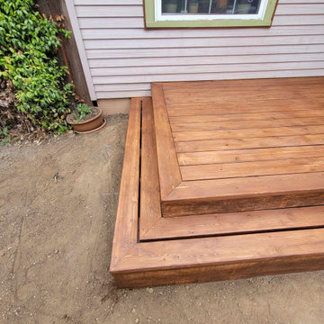 Tight knot cedar deck with rusticana stain