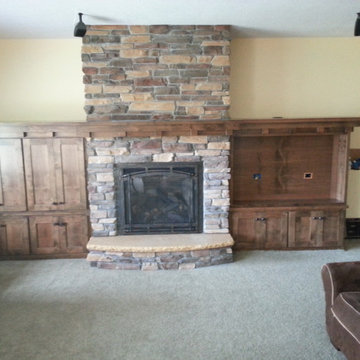 Custom fireplace surround, cabinetry, with built in TV cabinet