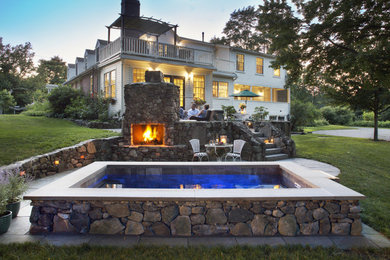 Hot tub - small farmhouse backyard stone and rectangular natural hot tub idea in Boston