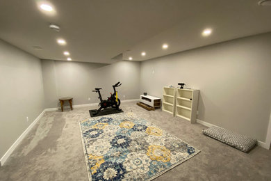Basement - modern basement idea in Calgary