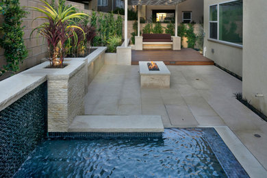 Inspiration for a modern pool remodel in Orange County