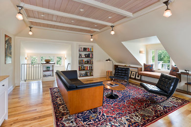 Example of a classic family room library design in Minneapolis