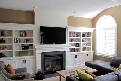 Example of a classic family room design in Toronto