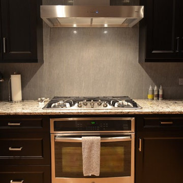 Dark Maple Kitchen with Modern Style and Surfaces in Aurora