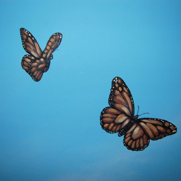 Sky Ceiling Mural with Butterflies, hand-painted in a bedroom by Mural Art LLC.