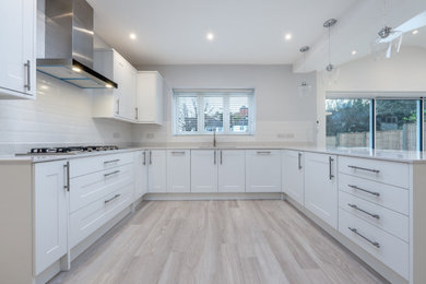 Photo of a modern kitchen in Surrey.