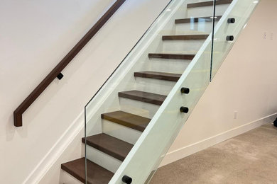 Minimalist Elegant White Staircase with Glass Railing
