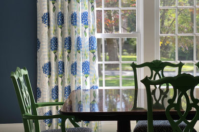Dining room - mid-sized transitional carpeted and beige floor dining room idea in New York with blue walls