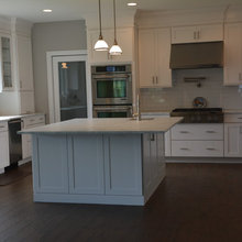 White Carrara Marble Kitchen and Master Bathroom