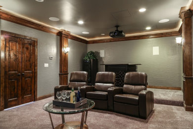 Photo of a large country enclosed home theatre in Dallas with grey walls, carpet and grey floor.