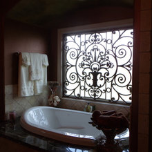 “Tableaux Faux Iron over tub